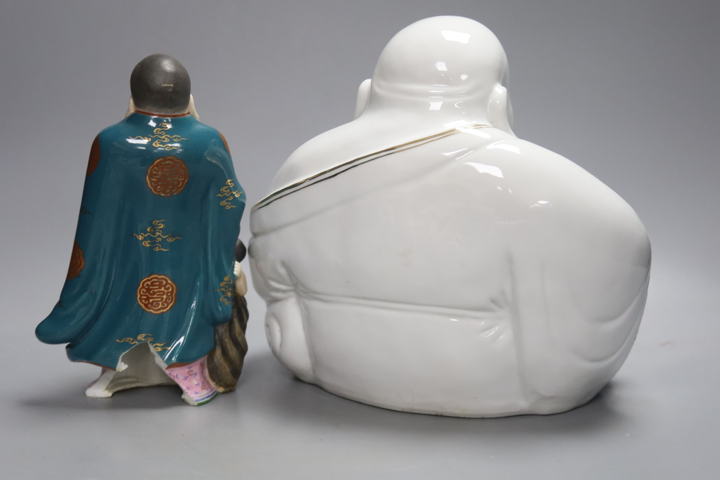 Two Chinese porcelain figures of Budai, tallest 23cm